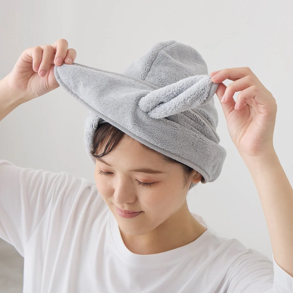 タオルを前で固定した様子